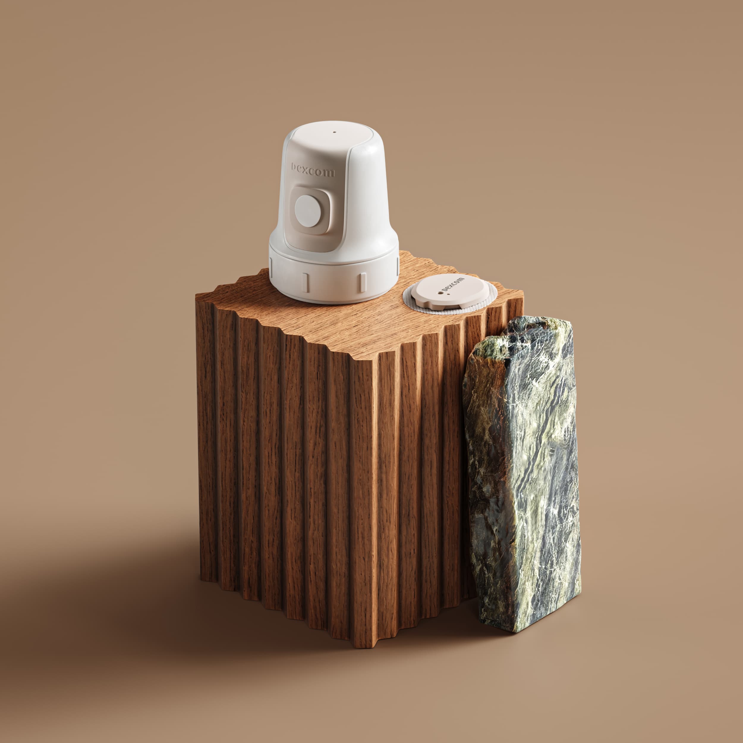 A Stelo continuous glucose monitor from Dexcom on a block of wood